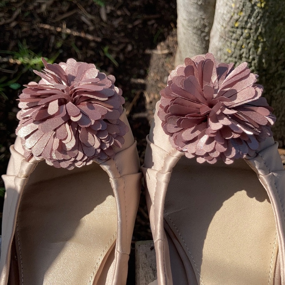 Audrey Brooke tan flats with “crumpet” Pom Pom’s